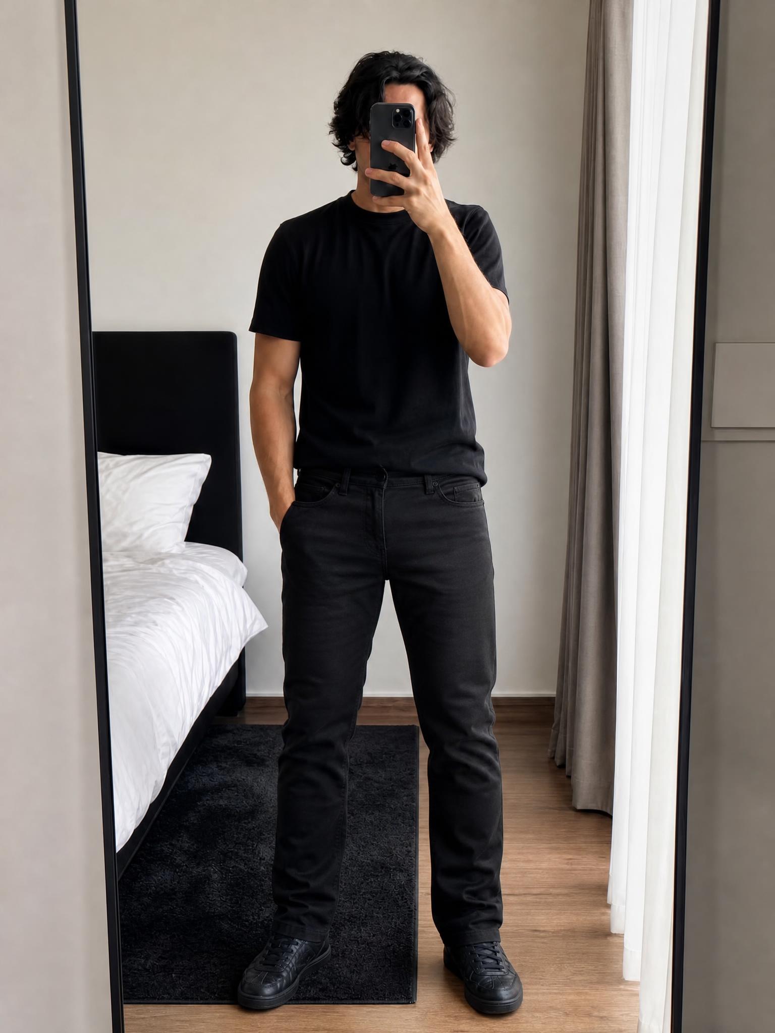 Black coated slim straight-leg jeans