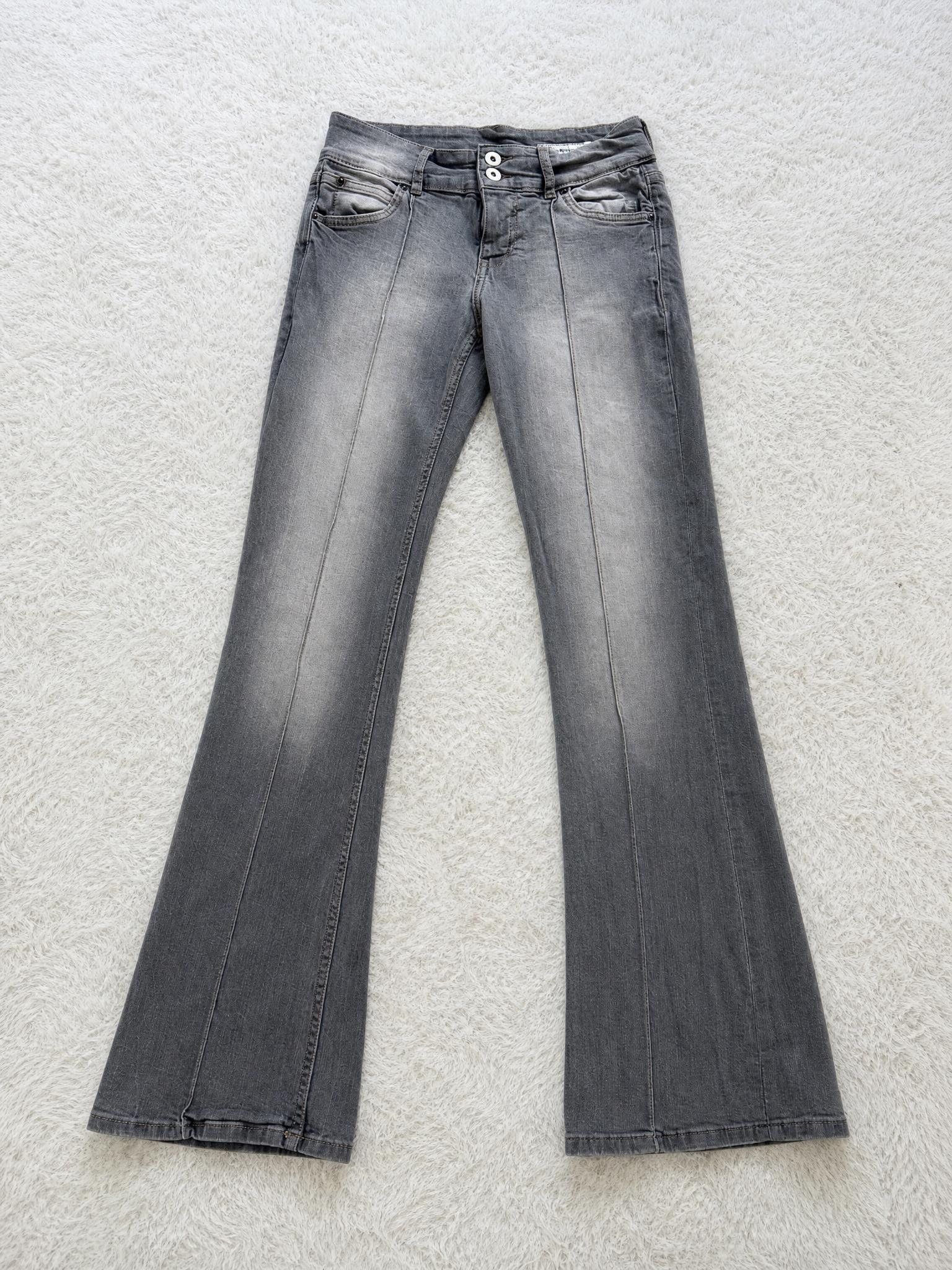 Grey washed bootcut jeans with double-button waist