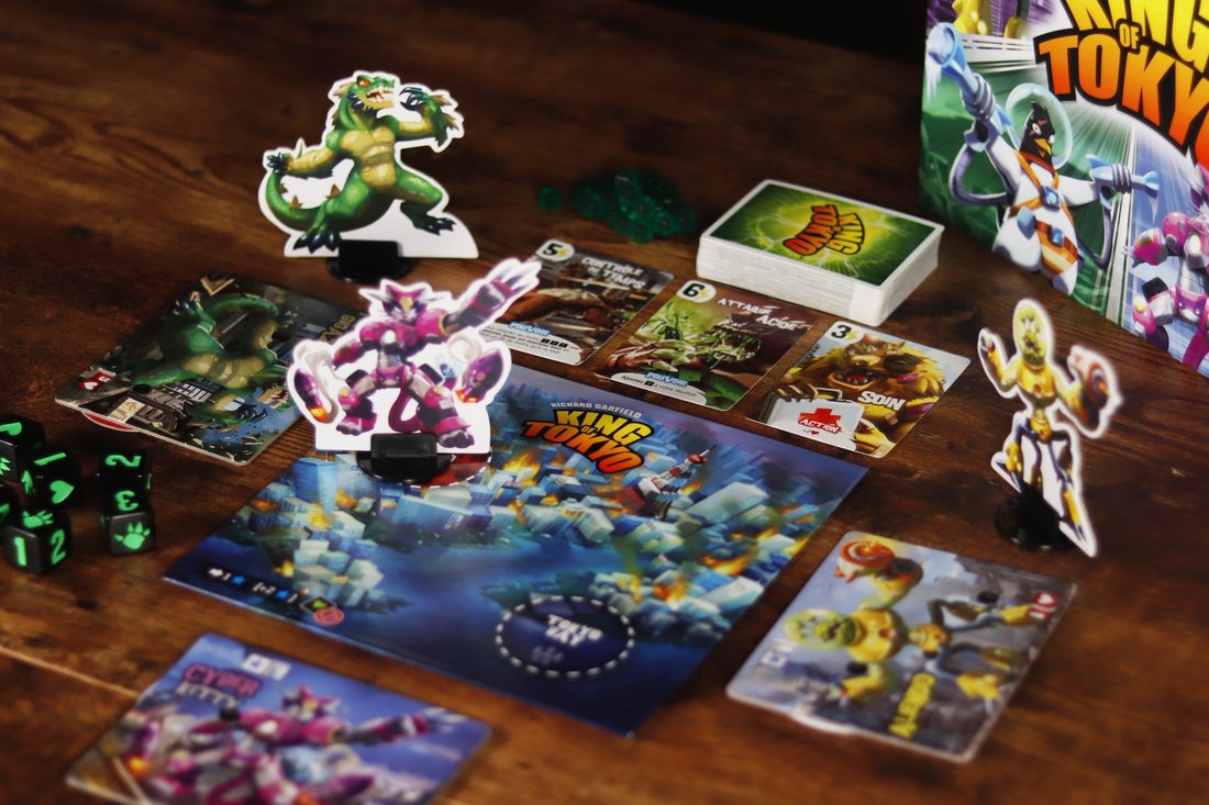 A game of King of Tokyo set up on the table