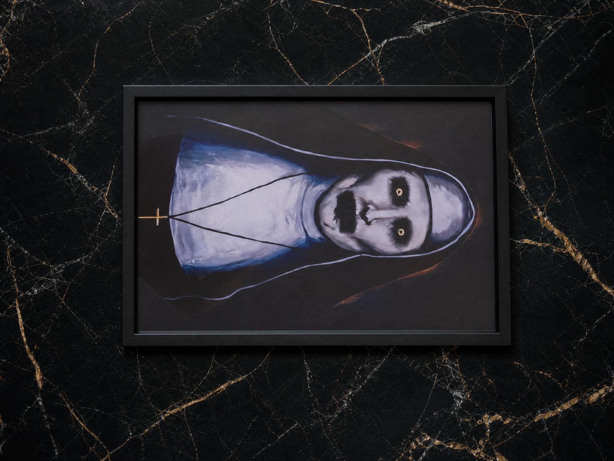 Framed monochrome portrait wall art in black frame