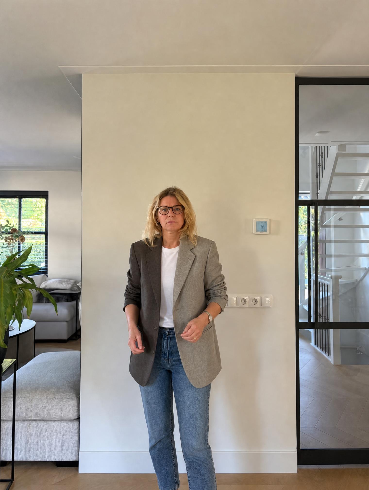 Grey tailored blazer with notch lapels and two-button fit