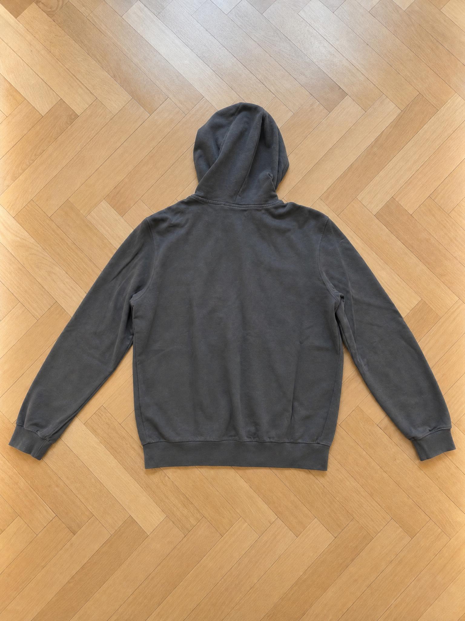 Dark charcoal grey pullover hoodie with ribbed trims