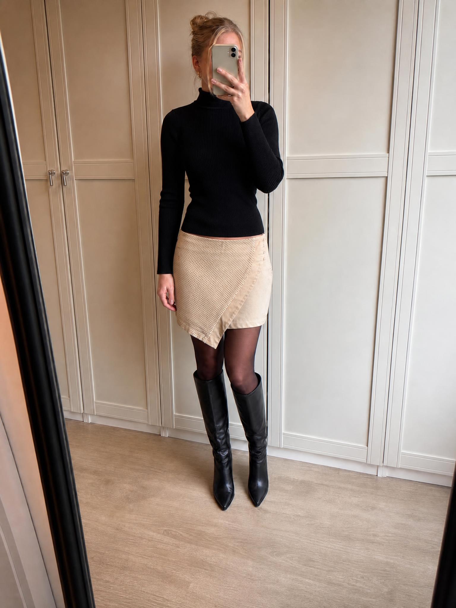 Beige perforated high-waisted mini skirt with button detail