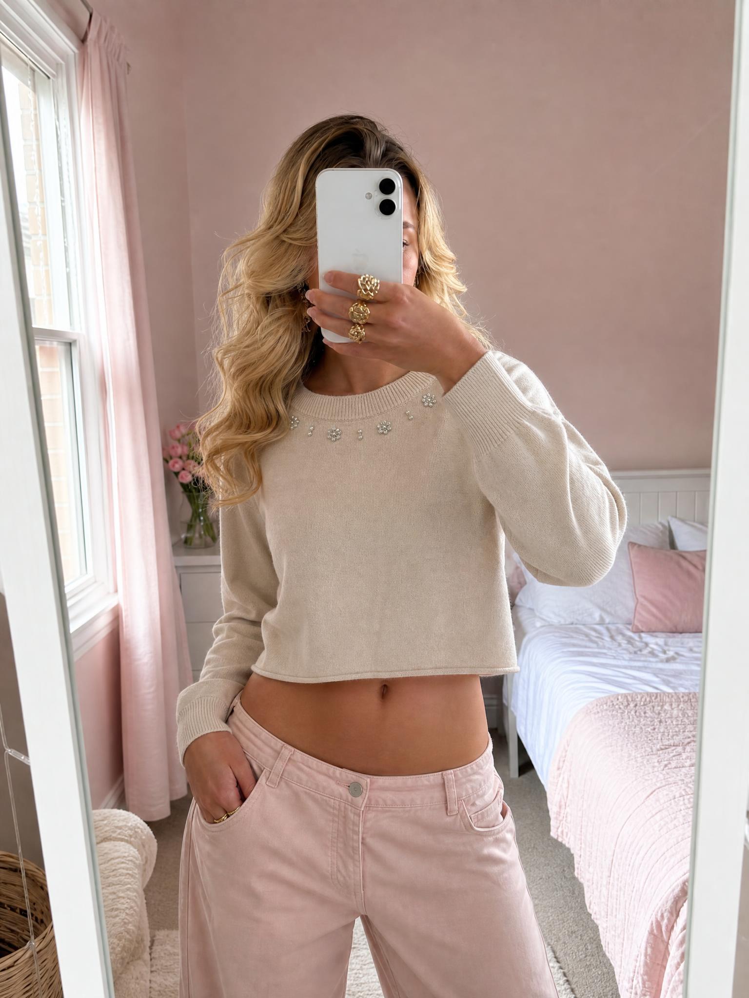 Beige cropped knit jumper with beaded floral neckline