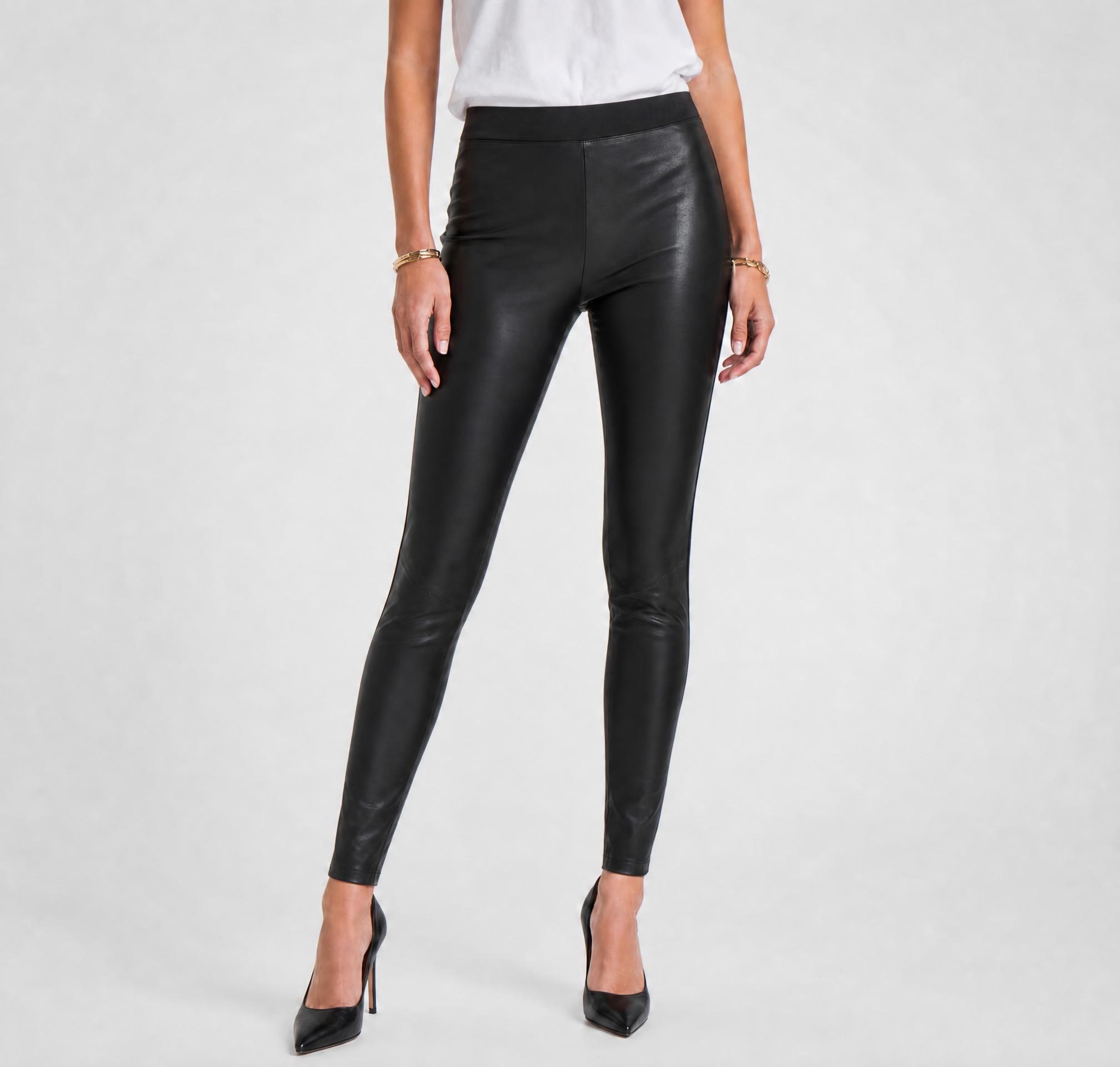 Black high-waisted faux leather leggings, slim fit, very good