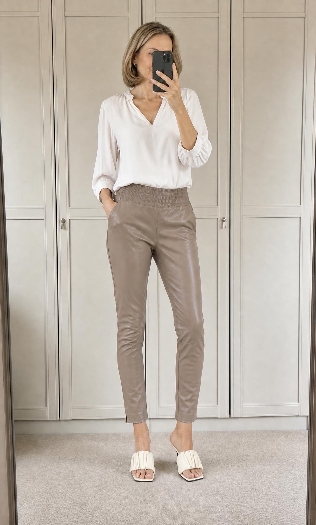 White satin-look V-neck blouse with gathered cuffs
