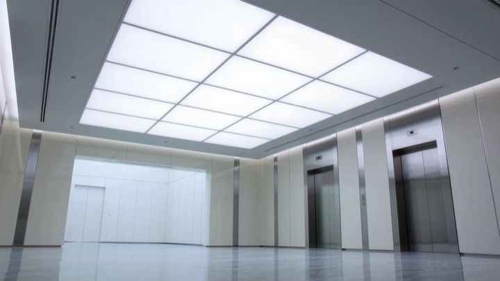 Empty white office corridor