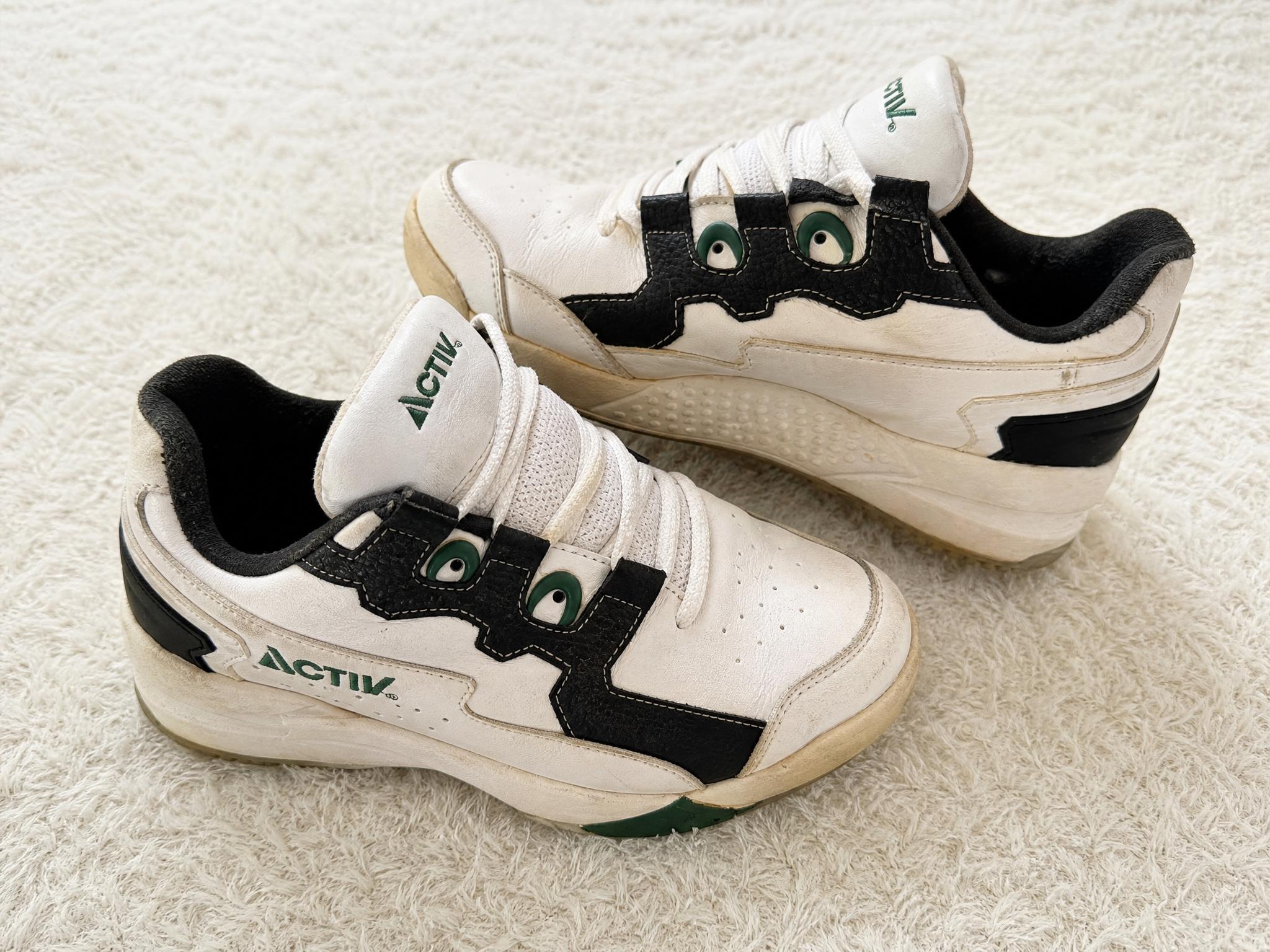 White Black High-Top Skate Trainers with Green Details