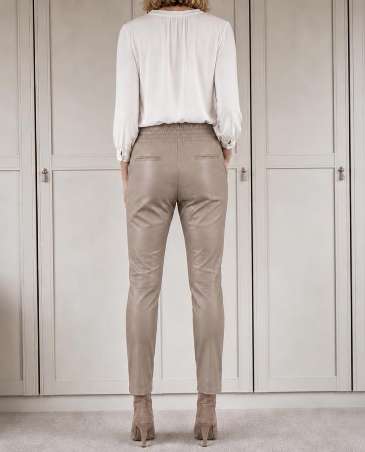 Taupe beige slim-fit trousers with elasticated waist