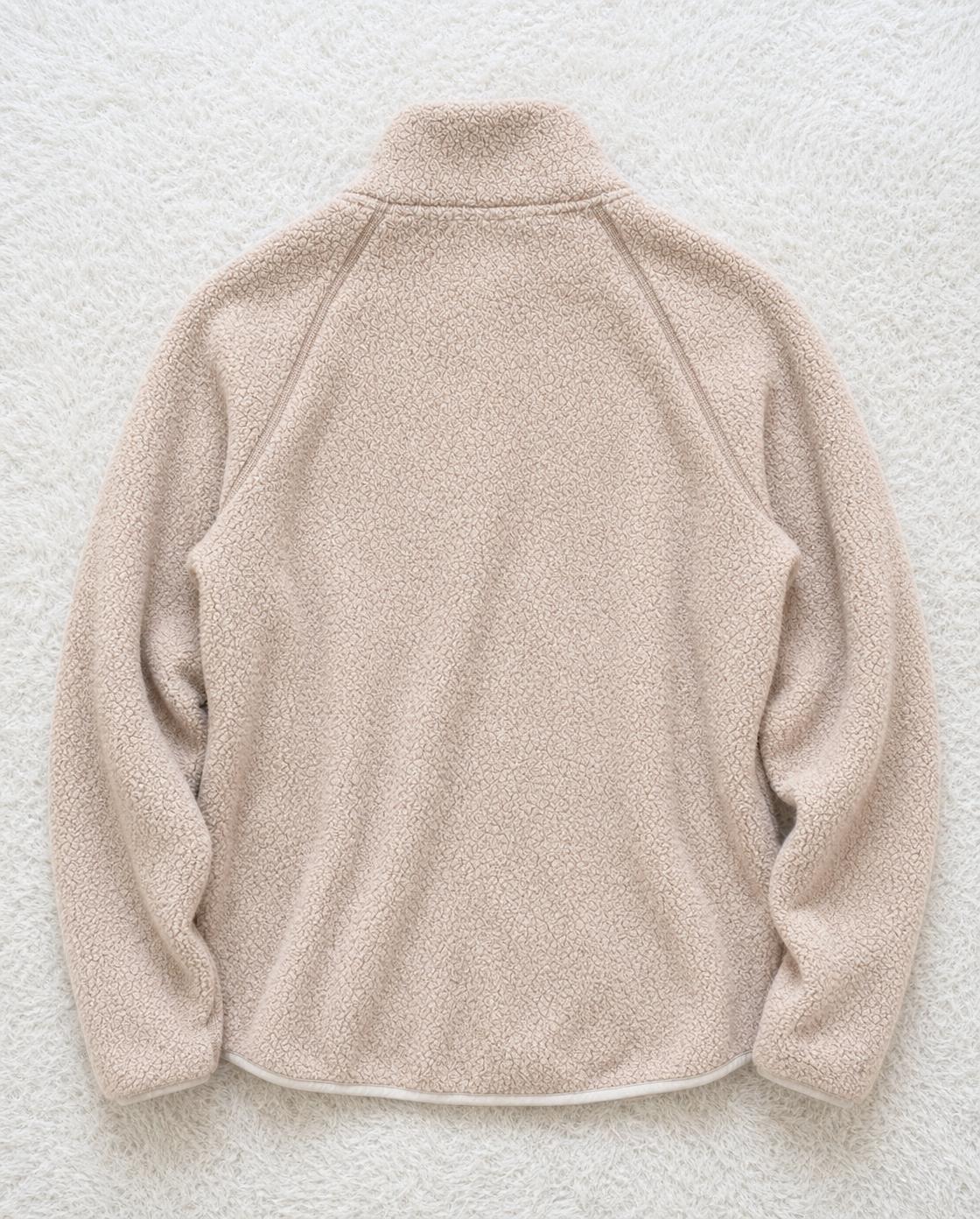 Beige textured fleece pullover jacket with high collar