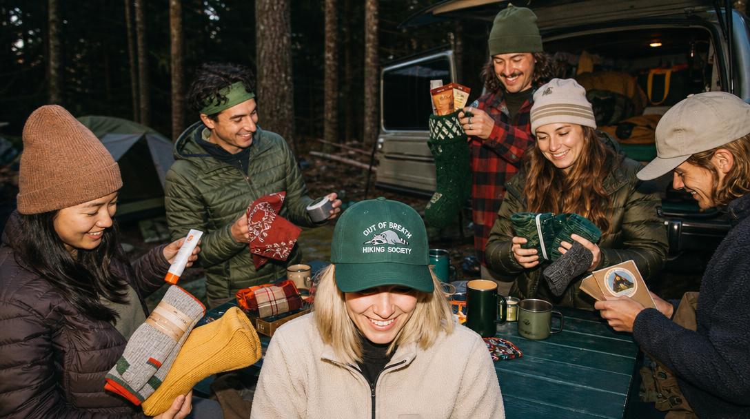 An open Christmas stocking filled with hiking gear gifts