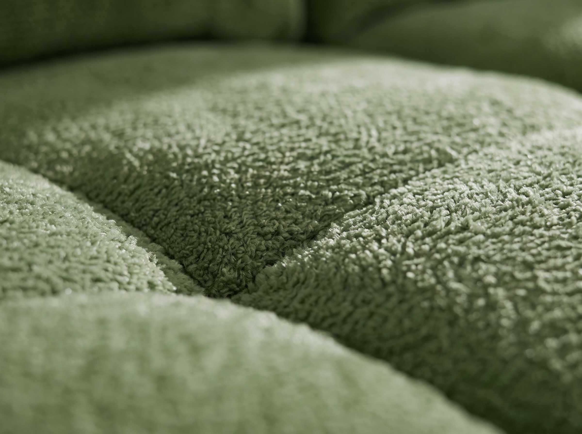 Macro of the chenille weave and quilting stitch in Chenille Willow Green