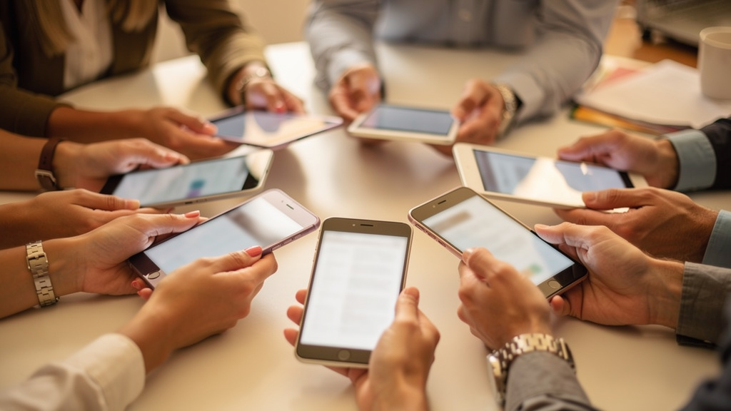 Teachers using secure devices for collaborative AI work